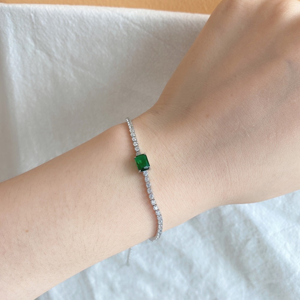 EMERALD STERLING SILVER TENNIS BRACELET